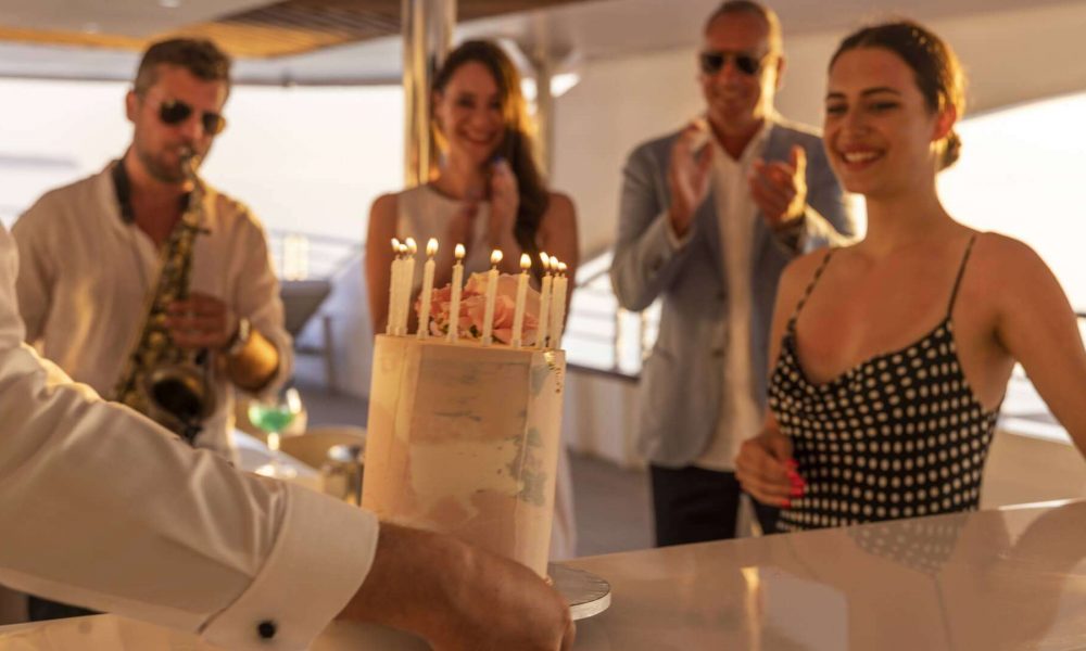 Private crewed yacht anchored in turquoise Caribbean waters during peak season